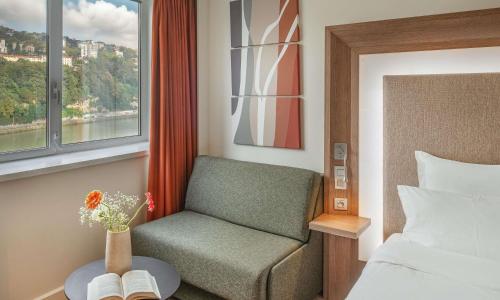 Novotel Lyon Centre-Confluence Bord de Saone - photo 2